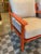 Pair orange lacquered open frame armchairs with new buff leather cushions. Reddish-orange finish on solid hardwood thin...