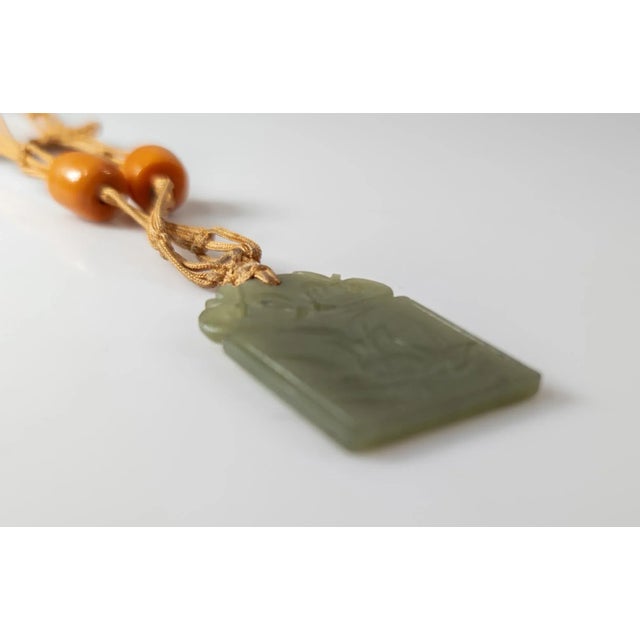 Textile Early 20th Century Chinese Carved Green Nephrite Jade Pendant Necklace For Sale - Image 7 of 8