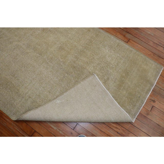 A mid 20th-century neutral color turkish rug Size: 3'9” x 7' Antique Turkish Oushak carpets such as these are desirable...