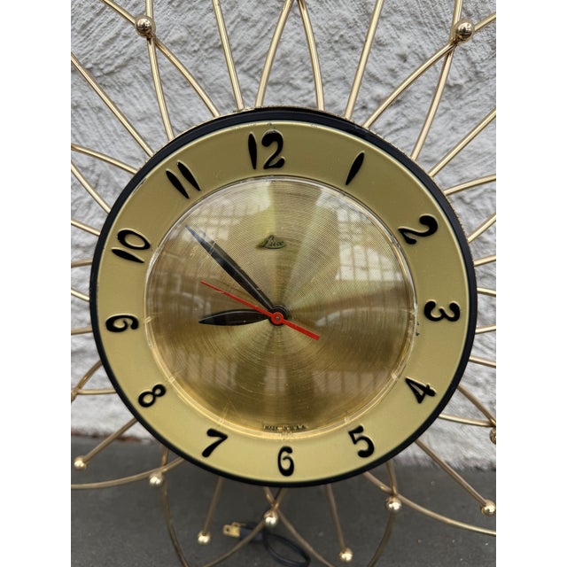 Vintage polished brass metal frame electric wall clock manufactured Robert Shaw Fulton Controls Company, Lux Time...
