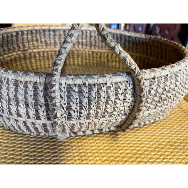 Rustic Vintage Handwoven African / Moroccan Style Oval Raffia Basket With Center Cross Handle For Sale - Image 3 of 8