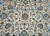 A beautiful mid-20th century Persian Kashan rug with an all-over intensely woven floral and scrolling vine pattern with...