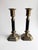 Beautiful vintage pair of solid brass candlesticks featuring elegant black columns and stepped octagonal bases. The...