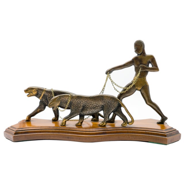 The Leopard Handler* Unknown, c. 1970s The Leopard Handler is organized as a horizontal procession, with the two animals...