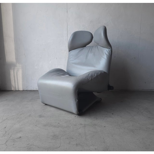 This is an all original Wink chair by Cassina. The Wink armchair by Toshiyuki Kita is an icon of design furniture. A...