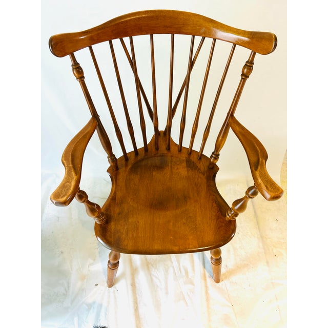 Vintage Ethan Allen Duxbury Windsor Nutmeg Maple Fiddle Back Arm Chair, in very sturdy and some age wear .