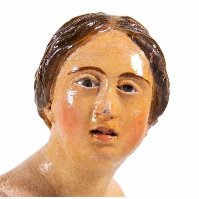 Head of woman man realized in polychrome ceramic with glass eyes. Neaples, 18th Century.