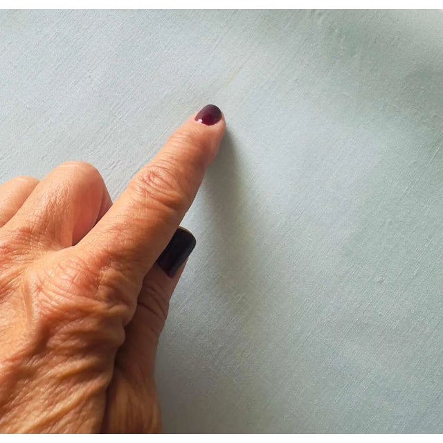 "A quietly exquisite example of heirloom linen making, this vintage French guest towel captures the understated refinement...