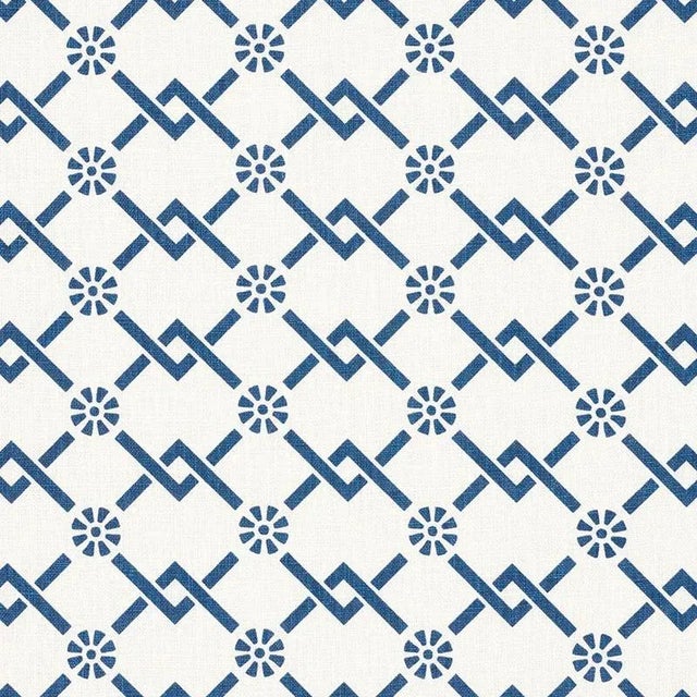 An interlacing lattice design with a charming floral accent, this versatile printed linen layers beautifully with other...