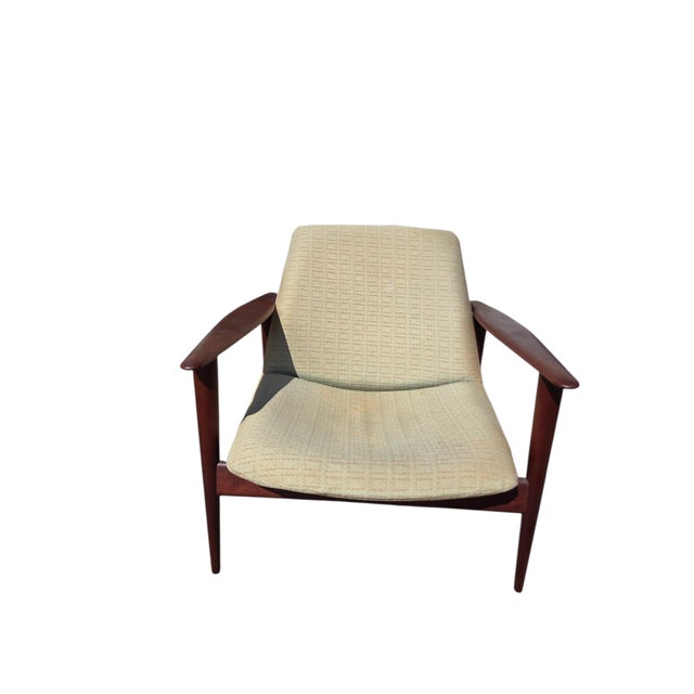 Very nice condition. Minor ware. appears to be original fabric. faint made in denmark stamp on underside of chair. Please...