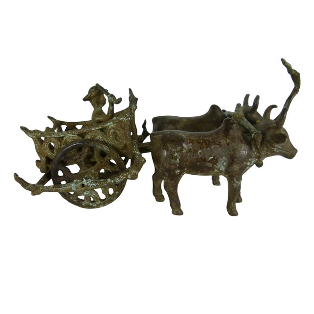 A late late 20th Century high quality Khmer-style reproduction of a traditional Indian bullock Ox cart statue, acquired...