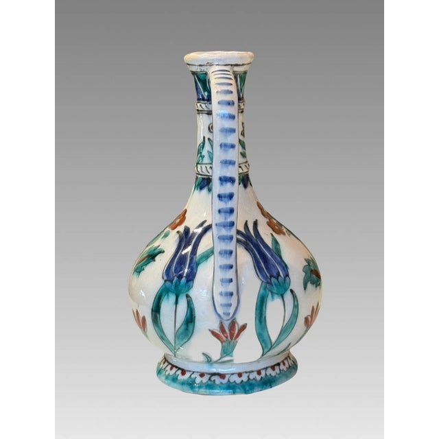 Eye Catching Hand Painted Antique Iznic Turkish Style Ewer with delicate florals in blue, burgundy and burnt orange...