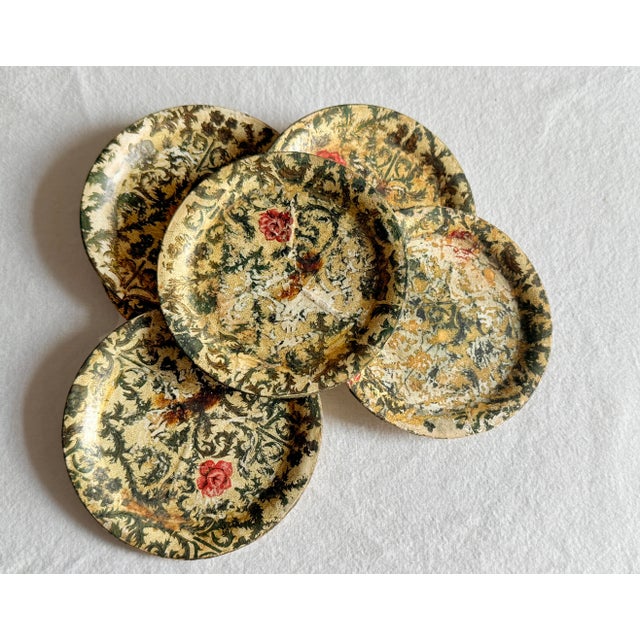 Vintage mid-century set of six paper mâché alcohol-proof coasters with the graphic character and richly aged surface...