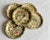 Vintage mid-century set of six paper mâché alcohol-proof coasters with the graphic character and richly aged surface...