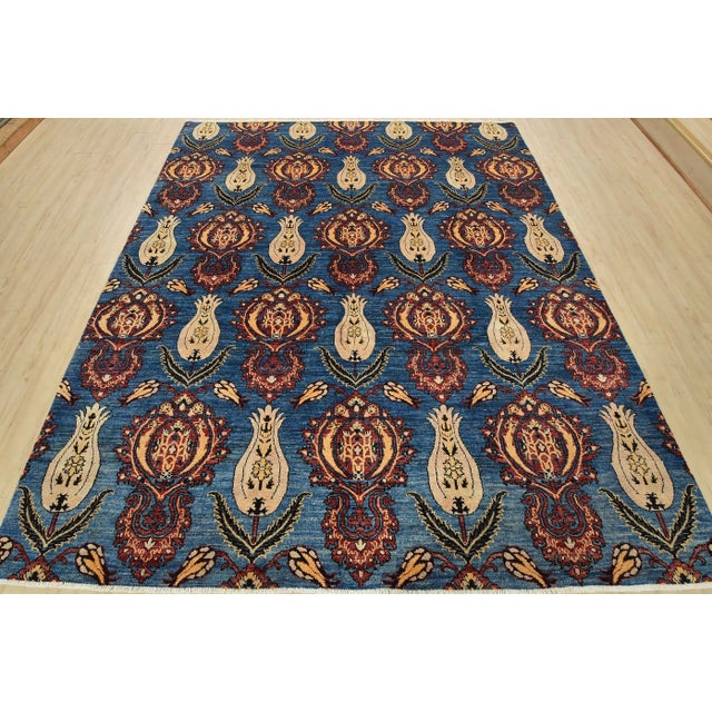 This traditional Ziegler rug is hand-knotted with an all-wool pile on a cotton foundation. This rug is new and in...