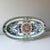 Vintage Italian pottery cool toned daisy motif hanging plate. The long oval shape is stunning above doorways, contrasting...