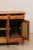 A French wooden credenza on paw feet from the early 19th century. This antique buffet from France has a rectangular-shaped...