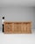 This buffet carries genuine presence, its natural light oak, two-tone paneled doors and drawers immediately setting the...