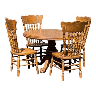 1980s Vintage Oak Dining Set With Paw Foot Table and Press Back Chairs by Virginia House - Set of 5 For Sale