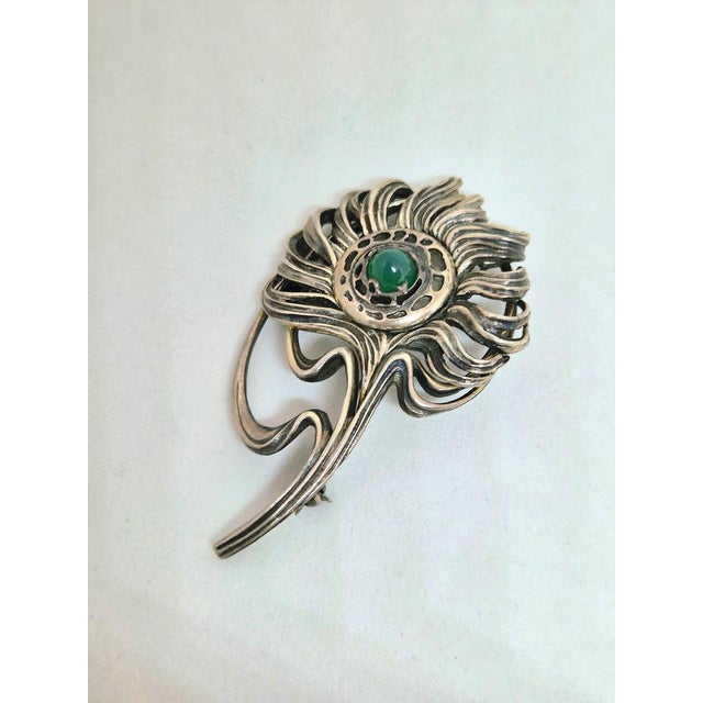A sterling silver brooch model "Peacock's feather" with Chrysoprase made by Jarmila Plocková (Muchas granddaughter) after...