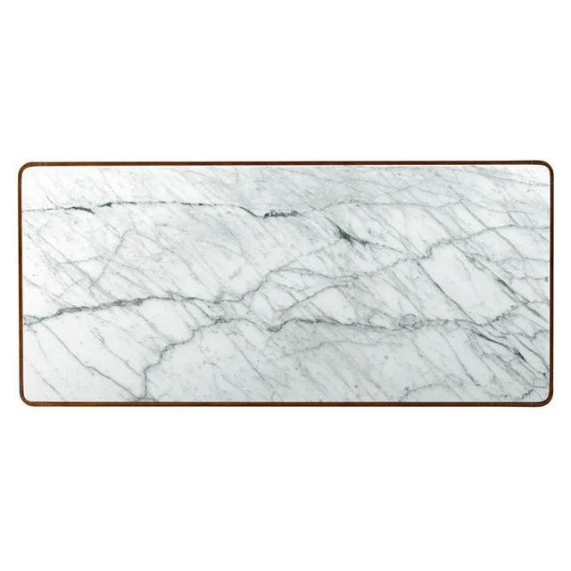 A lovely low table, styled in the spirit of mid 20th century modern works of the likes of Nelson and Eames. Tapering...