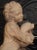 This charming pair of French terra cotta statues depicts a male and female musician and was made during the latter half of...
