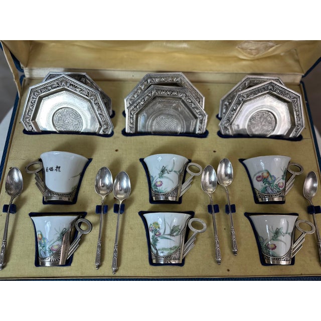 A refined early 20th-century Vietnamese tea and coffee service, showcasing a subtle blend of Asian and Western influences....