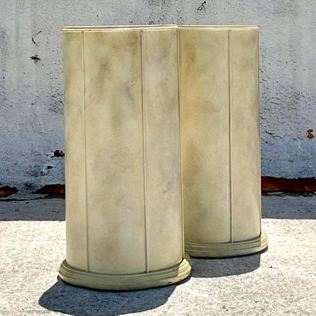 Elevate your décor with this unique pair of Vintage Boho Faux Goatskin Pedestals. These American-style pieces boast a chic...