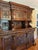 An impressive French mid-19th-century Rococo-style walnut buffet, circa 1850–1860, featuring elaborate hand-carved...