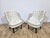 Exclusive pair of Chesterfield armchairs from the 1960s. Upholstered in genuine leather with deeply quilted buttons,...
