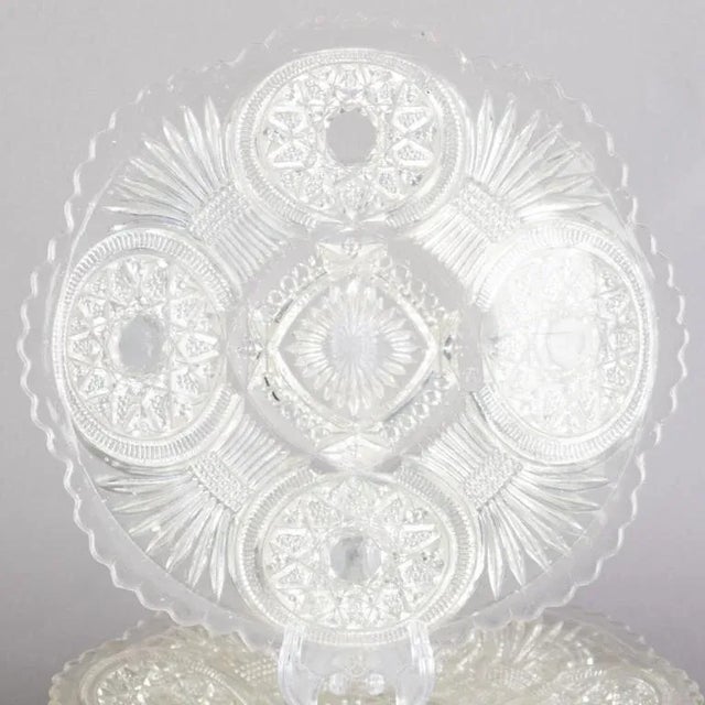 Introduce timeless beauty to your space with this Antique Set Of Eight Victorian Davidson Pressed Glass Dish. An ideal...