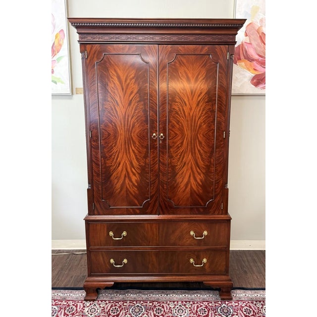The Henkel Harris Model 1247 Mahogany Armoire is a finely crafted traditional storage piece with rich mahogany graining,...