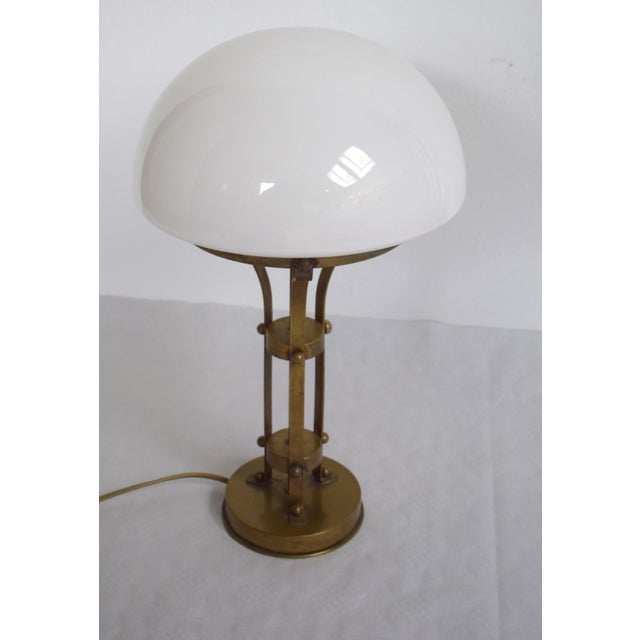 Art Nouveau brass table lamp. Probably made in Austria. Beautiful patina, opal glass shade. 1 E27 socket Cable has been...