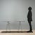 Table with chromed metal trestles, laminate top. This piece is attributed to the mentioned designer/maker. It has no...