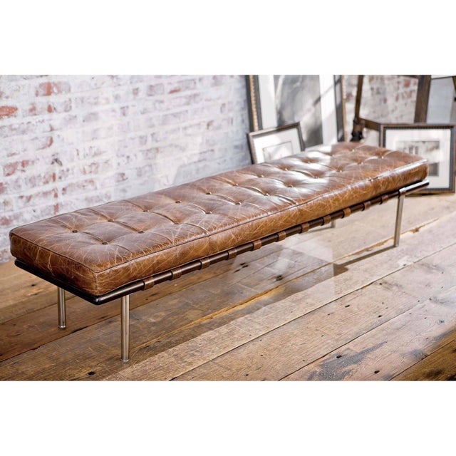 Hand cut, sewn and buttoned in vintage brown leather, the Tufted Gallery Bench sets the example for chic, conversational...