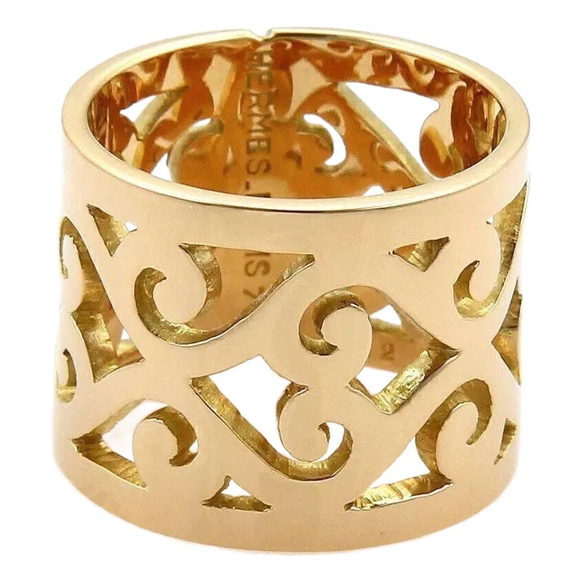 18111 - Hermes 18k Yellow Gold Open Swirl Pattern 15mm Wide