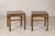 This pair of vintage Chinese side tables features a handsome square form, warm brown wood finish, and details inspired by...
