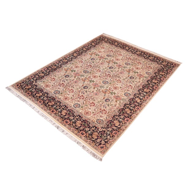 Designed with mesmerizing intricacy and gorgeous color palette, this hand-knotted masterpiece demonstrates the beauty and...
