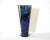 A vintage featherd, swirled, or marbled blue glass vase, probably mold blown, with a clear glass base, and cut glass top...