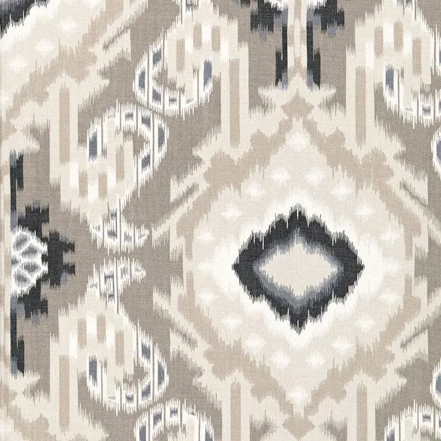 Inspired by traditional ikats, this dramatic overscale print combines paisleys and geometrics into a loose, painterly...