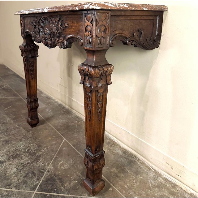 19th Century French Walnut Louis XIV Marble Top Console is an exquisite example of the style named after the Sun King that...