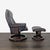 This Stressless lounge chair and matching ottoman offer classic comfort with a sleek, dark brown leather finish and sturdy...