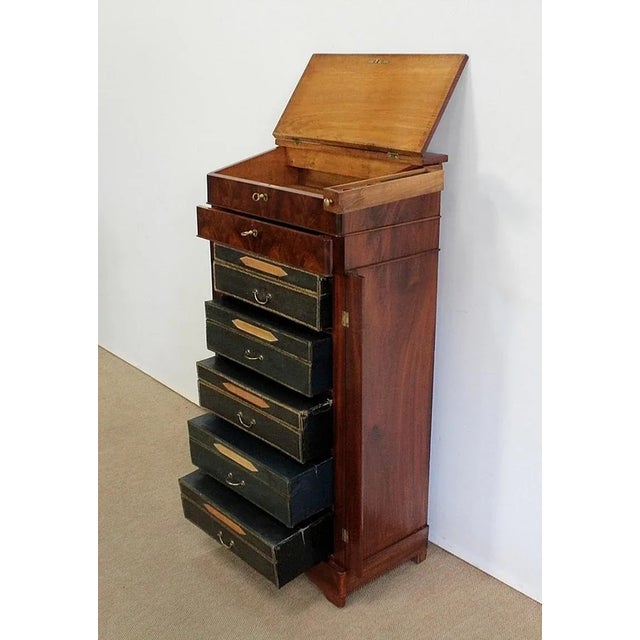 Mahogany Cardboard Background and Mahogany Veneer of a slope, drawer, 5 cartons and a small ink drawer on the right side....