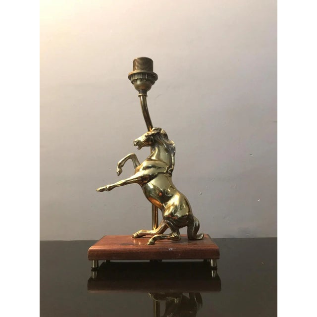 We're offering a handcrafted vintage table lamp consisting of a rectangle wooden base with a dark walnut stain. with a...