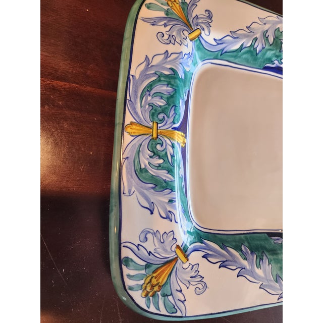 Great looking rectangular shape platter that is hand painted. This can be hung in either direction.