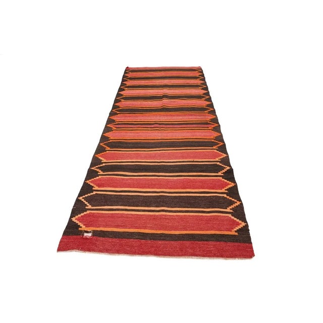 Vintage handwoven decorative kilim rug from Kars region of Turkey. Approximately 50-60 years old. In very good condition.