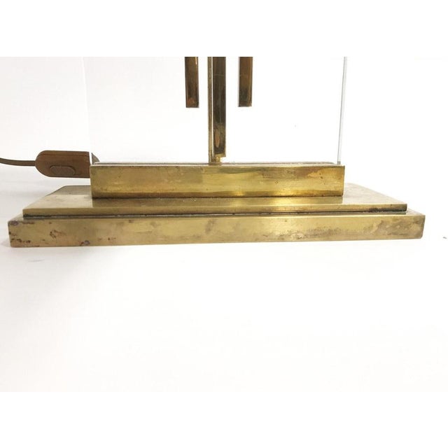 Elegant bronze and acrylic glass modernist table lamp. Beautiful patina. The use of the acrylic glass makes the sculpture...