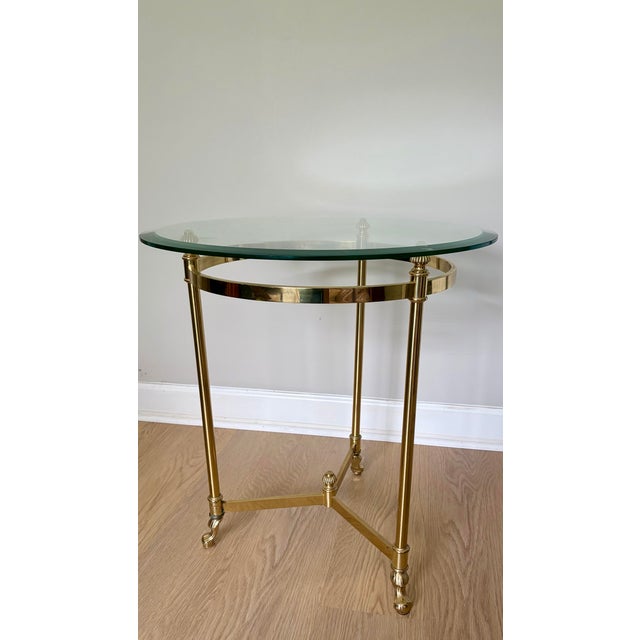 A striking vintage cocktail or occasional table in a distinctive Mid-Century Italian style, featuring an architectural...