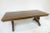 This vintage oak dining room table from the 1970s features a stunning solid oak extension in the middle, showcasing...