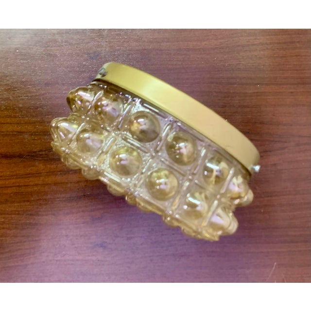 A bathroom flush mount or wall sconce composed of bubble glass. Designed/commissioned by E. S. Horn in Denmark and...